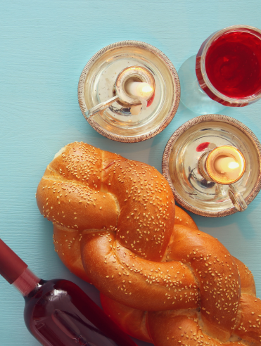 Shabbat Photo with challah, wine, and candles